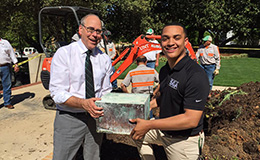 UNT President Neal Smatresk with the 1962 time capsule.