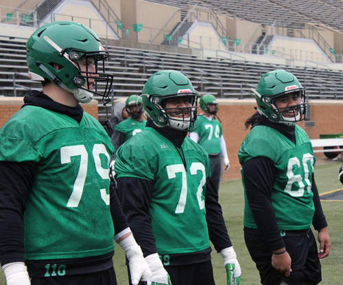 Three UNT football players suited up