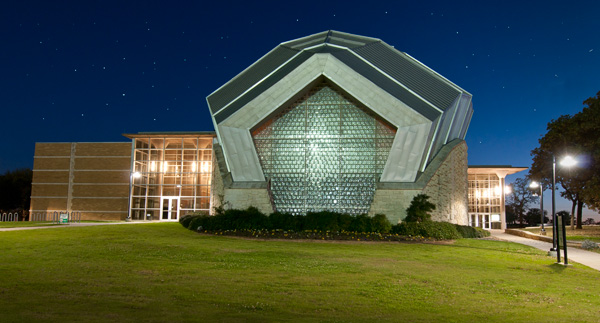 Exterior, evening photo of Winspear Performance Hall