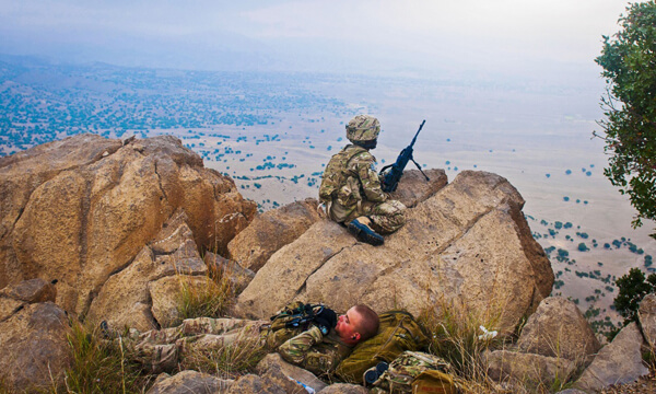 Soldiers on a mountain cliff