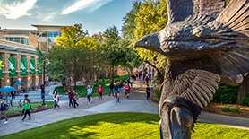 UNT campus near the union with eagle statue in the foreground