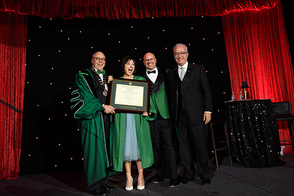 2018 Wingspan, President Smatresk presents Carmen Cusak with an honary degree.