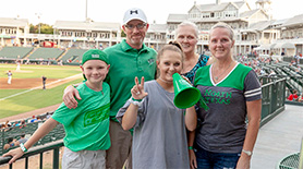 UNT alumni family at Dr. Pepper Ballpark in Frisco, Texas