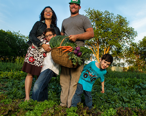 Ryan Crocker ('06) and his wife, Christina Treviño ('06), run Earthwise Gardens and Produce in Denton. (Photo by Angilee Wilkerson)